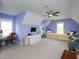 Spacious bedroom featuring a vaulted ceiling, twin beds, a desk and lots of natural light at 1180 Duke Farm Dr, Wake Forest, NC 27587