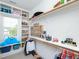 Walk-in closet with built-in shelving, hanging racks, and ample storage space at 1180 Duke Farm Dr, Wake Forest, NC 27587