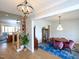 Spacious living area and dining room with hardwood floors and stylish decor, perfect for entertaining at 1180 Duke Farm Dr, Wake Forest, NC 27587