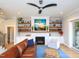 Living room with a fireplace, built-in shelves, and a comfortable seating area, offering a relaxing atmosphere at 1180 Duke Farm Dr, Wake Forest, NC 27587
