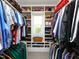 Spacious walk-in closet featuring custom shelving and ample storage space at 1180 Duke Farm Dr, Wake Forest, NC 27587
