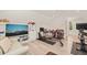 Bright home gym with modern exercise equipment, desk and workspace, and comfortable seating area at 120 Lu Tom Ln, Wendell, NC 27591