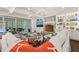 Inviting living room with a fireplace, built-ins, and seamless access to the outdoor area at 120 Lu Tom Ln, Wendell, NC 27591