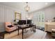 Home office featuring a large wooden desk, neutral color walls, and natural light at 120 Lu Tom Ln, Wendell, NC 27591