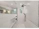 A luxurious walk-in shower boasts designer tile, a rainfall shower head, and a built-in niche at 120 Lu Tom Ln, Wendell, NC 27591