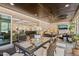 Sunroom featuring a dining area, brick wall, and views into the home's living areas at 120 Lu Tom Ln, Wendell, NC 27591
