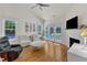 Inviting living room with hardwood floors, a fireplace, ample natural light and ceiling fan at 1201 Red Beech Ct, Raleigh, NC 27614