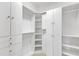 Spacious walk-in closet features built in shelving and ample storage for an organized wardrobe at 1201 Red Beech Ct, Raleigh, NC 27614