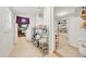 Spacious pantry with tile floors and an abundance of shelving for optimal storage and organization at 1209 Eva St, Durham, NC 27703
