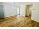 Open dining area with modern light fixture and access to the laundry room and outdoor living at 121 Earnest Way, Kenly, NC 27542