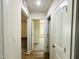 Inviting hallway with wood-look floors and neutral paint creates a warm and welcoming atmosphere at 121 Earnest Way, Kenly, NC 27542