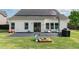 Large backyard featuring patio, solar panels, and sandbox for  at 123 Jonalker Ct, Clayton, NC 27520