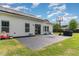 Expansive backyard with patio, solar panels, and basketball hoop at 123 Jonalker Ct, Clayton, NC 27520