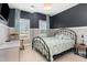 Cozy bedroom with patterned curtains, metal bed frame, and neutral carpet at 123 Jonalker Ct, Clayton, NC 27520
