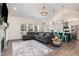 Open floor plan showing the living room, kitchen, and dining area with modern decor at 123 Jonalker Ct, Clayton, NC 27520