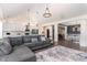 Spacious living room showcasing the open floor plan with kitchen, dining area, and stylish decor at 123 Jonalker Ct, Clayton, NC 27520