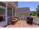 Large back deck with bench seating and a grill, perfect for entertaining at 130 Skipwith Dr, Wendell, NC 27591