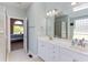 Bright bathroom featuring double vanity sinks and natural light at 130 Skipwith Dr, Wendell, NC 27591