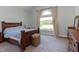 Comfortable bedroom with vaulted ceiling and natural light at 130 Skipwith Dr, Wendell, NC 27591