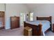 Spacious bedroom with view to bathroom and a walk-in closet at 130 Skipwith Dr, Wendell, NC 27591
