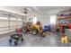 Large garage perfect for farm equipment or a large work shop with overhead door access at 130 Skipwith Dr, Wendell, NC 27591