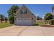 Detached garage with ample parking space and potential for storage or workshop at 130 Skipwith Dr, Wendell, NC 27591