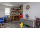 Organized garage with workbench, tools, and storage solutions at 130 Skipwith Dr, Wendell, NC 27591
