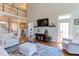 Spacious living room with view of a staircase, second floor and back yard at 130 Skipwith Dr, Wendell, NC 27591