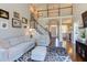 Spacious living room with a view to the second floor and staircase to the second level at 130 Skipwith Dr, Wendell, NC 27591