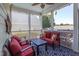 Relaxing screened porch with comfortable seating, ideal for enjoying the outdoors at 130 Skipwith Dr, Wendell, NC 27591