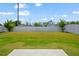 Spacious backyard with a full lawn and a white fence at 1305 Addison Lake St, Fuquay Varina, NC 27526