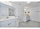 Spacious bathroom with dual vanities and modern fixtures at 1305 Addison Lake St, Fuquay Varina, NC 27526