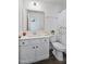 Bathroom with white cabinets, gray countertop, with a toilet, and shower-tub combo at 1305 Addison Lake St, Fuquay Varina, NC 27526