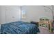 Comfortable bedroom featuring a double closet and natural lighting from a window at 1305 Addison Lake St, Fuquay Varina, NC 27526