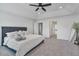 Spacious bedroom with a fan and plush carpet at 1305 Addison Lake St, Fuquay Varina, NC 27526