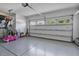Spacious two-car garage with epoxy flooring and overhead door at 1305 Addison Lake St, Fuquay Varina, NC 27526