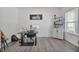 Functional office with a large window, modern desk setup, and ample storage, perfect for productivity at 1305 Addison Lake St, Fuquay Varina, NC 27526