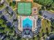 Aerial view of the community pool, tennis courts, playground, and parking area at 1328 Palace Garden Way, Raleigh, NC 27603