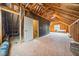 Unfinished attic showcasing ample space and potential for customization, offering endless possibilities at 1328 Palace Garden Way, Raleigh, NC 27603