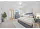 Bright bedroom featuring a neutral palette, plush carpet, and ample natural light streaming through the window at 1328 Palace Garden Way, Raleigh, NC 27603