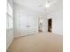 Bedroom featuring soft carpet, natural light, with easy access to an ensuite bathroom and closet for convenience at 1328 Palace Garden Way, Raleigh, NC 27603