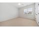 Bright bedroom features neutral carpet and natural light from a window at 1328 Palace Garden Way, Raleigh, NC 27603