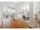 Open-concept home featuring hardwood floors, decorative columns, and spacious living areas with ample natural light at 1328 Palace Garden Way, Raleigh, NC 27603