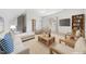 Inviting living room featuring vaulted ceilings and a relaxing seating arrangement at 1328 Palace Garden Way, Raleigh, NC 27603