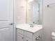 Bathroom featuring a vanity with storage and a large mirror over a sink at 1380 Channing Park Cir, Cary, NC 27519