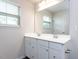 Spacious bathroom with a double vanity, large mirror, and natural light, for a functional and elegant space at 1380 Channing Park Cir, Cary, NC 27519