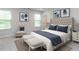 Bright bedroom with a plush bed, chair and neutral decor, creating a relaxing and inviting atmosphere at 1380 Channing Park Cir, Cary, NC 27519