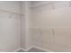 Spacious walk-in closet with multiple shelves, offering ample storage and organization solutions at 1380 Channing Park Cir, Cary, NC 27519