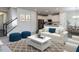 Cozy living room with modern furnishings and an adjacent kitchen area at 1380 Channing Park Cir, Cary, NC 27519