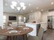 Open concept living space showcasing the dining area, living room, and kitchen at 1380 Channing Park Cir, Cary, NC 27519
